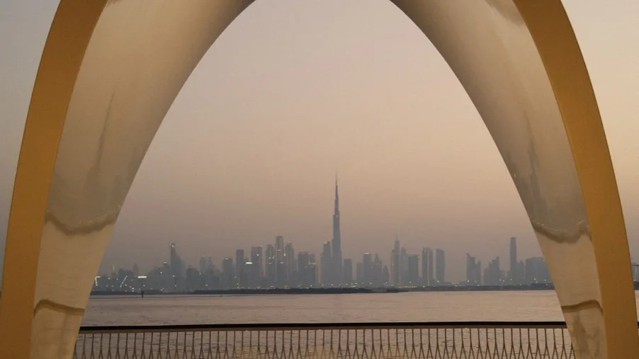Dubai skyline and Burj Khalifa seen from a terrace at sunset